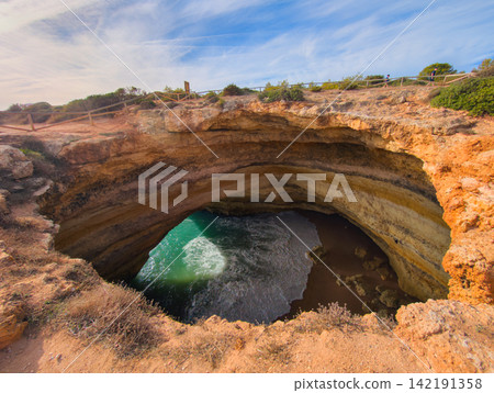 Clifftop View Into Benagil Cave Opening Clifftop View Into Benagil Cave Opening 142191358