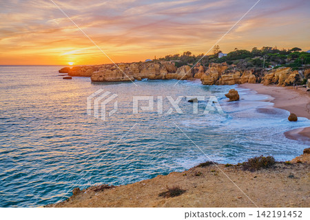 Sunset Over Praia de Sao Rafael Beach in Algarve 142191452