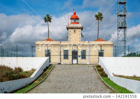 Picture of spectacular Ponta da Piedade Lighthouse on cliffs in Lagos, Port 023 142191558