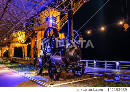 Belem, Brazil - Dec 07, 2025: Old winches on the Docks Station in Belem, Para, northern Brazil at night Belem, Brazil - Dec 07, 2025: Old winches on the Docks Station in Belem, Para, northern Brazil at night 142193089