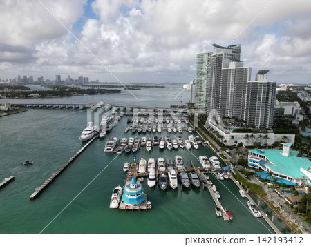 Miami south beach view. Yacht club. Marina in Miami, Florida. Private docks. South pointe Miami marina with luxury yacht. Summer vacation. Luxury South beach marina. Luxury yacht. Florida skyscraper Miami south beach view. Yacht club. Marina in Miami, Florida. Private docks. South pointe Miami marina with luxury yacht. Summer vacation. Luxury South beach marina. Luxury yacht. Florida skyscraper 142193412