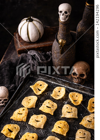 Halloween chips in shape of ghost Halloween chips in shape of ghost 142194296