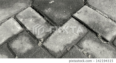 Monochrome concrete paving block pattern texture Monochrome concrete paving block pattern texture 142194315