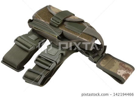 Tactical drop leg holster angle shot isolated on white background. Military camouflage pistol thigh rig Tactical drop leg holster angle shot isolated on white background. Military camouflage pistol thigh rig 142194466