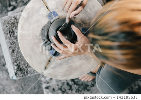 The process of creating pottery. The process of creating pottery. 142195633