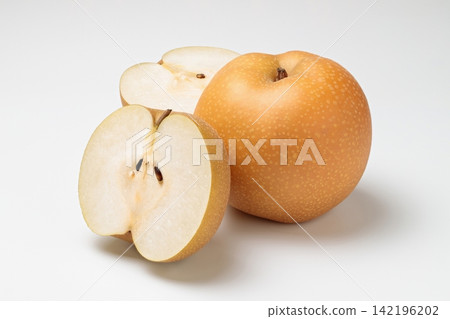 One Hosui pear and two halves of it, with their cross-sections photographed against a white background. One Hosui pear and two halves of it, with their cross-sections photographed against a white background. 142196202