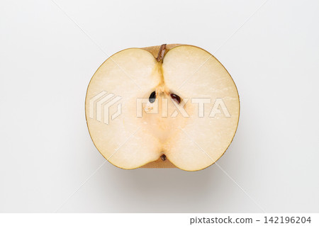A cross-section of a halved Hosui pear, photographed from directly above against a white background. A cross-section of a halved Hosui pear, photographed from directly above against a white background. 142196204