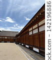A walkway in a historic building 142196886