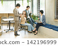 Four young Japanese men and women having a meeting in the office. Four young Japanese men and women having a meeting in the office. 142196999