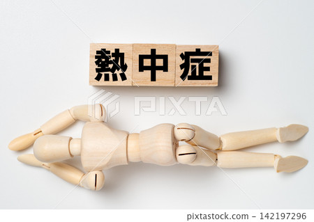 An image depicting a person who has collapsed from heatstroke, representing a health risk. An image depicting a person who has collapsed from heatstroke, representing a health risk. 142197296