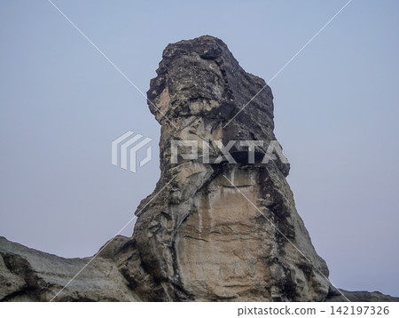 The iconic Sphinx rock formation at Klayar Beach (Pantai Klayar) in Pacitan, East Java, Indonesia. The iconic Sphinx rock formation at Klayar Beach (Pantai Klayar) in Pacitan, East Java, Indonesia. 142197326