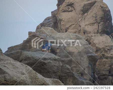 The iconic Sphinx rock formation at Klayar Beach (Pantai Klayar) in Pacitan, East Java, Indonesia. 142197328