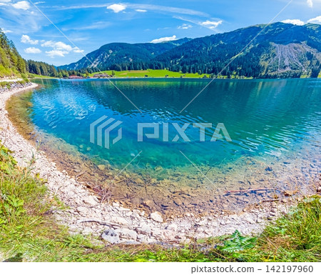 Clear turquoise water of Vilsalpsee in Tannheim Tyrol Austria Clear turquoise water of Vilsalpsee in Tannheim Tyrol Austria 142197960