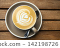 cup of cappuccino on the wooden table 142198726
