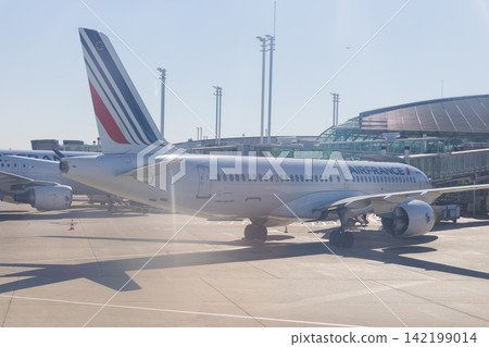 A clear, sunny day at Charles de Gaulle Airport in Paris, France. A clear, sunny day at Charles de Gaulle Airport in Paris, France. 142199014