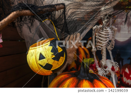 Hanging black jack o lantern candy bucket for Halloween 2026 Hanging black jack o lantern candy bucket for Halloween 2026 142199039