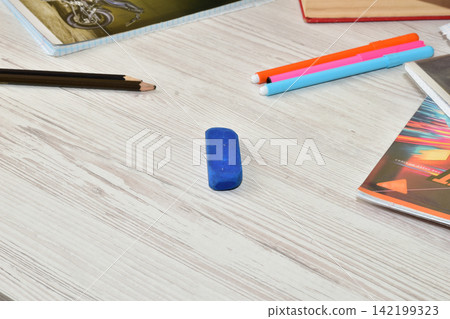 Desk surface and pencils. Desk surface and pencils. 142199323