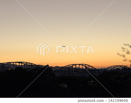Arch bridge, sunset, airplane Arch bridge, sunset, airplane 142199698