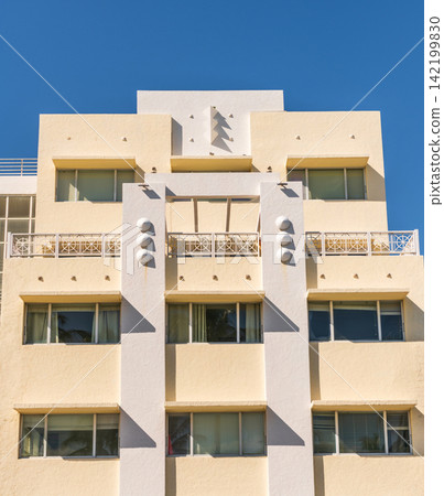 Architectural district Art Deco. Modern building of Miami beach. Ocean drive. Miami Beach in Ocean Drive Florida. Art Deco building architecture. Architectural building. Art deco landmark Architectural district Art Deco. Modern building of Miami beach. Ocean drive. Miami Beach in Ocean Drive Florida. Art Deco building architecture. Architectural building. Art deco landmark 142199830