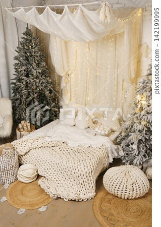 Cozy Hygge Style Holiday Home Decor with Chunky Knits and Warm Lighting 142199995