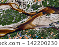 An aerial view of the Grande River, which winds through sandbars and settlements before converging with the Santo Amaro River. 142200230