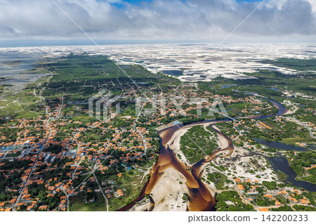 Extensive aerial photography of Santo Amaro and the Grande River overlooking the white sand dunes. Extensive aerial photography of Santo Amaro and the Grande River overlooking the white sand dunes. 142200233