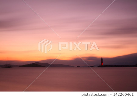 Seascape at sunshine. Lighthouse and sailings on the coast. Seaside town of Turgutreis and spectacular sunshine 142200461