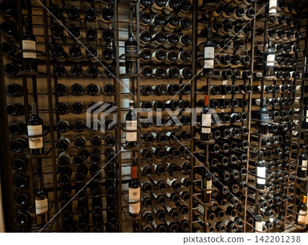 Buenos Aires, Argentina - October 27, 2025: Wall Display of Wine Bottles in Retail Interior Buenos Aires, Argentina - October 27, 2025: Wall Display of Wine Bottles in Retail Interior 142201238