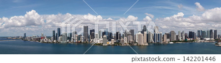 Aerial panorama of Brickell in Miami. Downtown Miami skyline on a sunny day. Scenic view of Miami Beach and Brickell. Miamis Skyscrapers. Brickell famous landmarks. Miami downtown landscape. 142201446