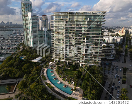 Top view of South Miami. Florida famous coastline. Miami skyline with skyscrapers. Aerial view of Miami in summer. Miami shore with skyscrapers. Top view of South Miami. Florida famous coastline. Miami skyline with skyscrapers. Aerial view of Miami in summer. Miami shore with skyscrapers. 142201452