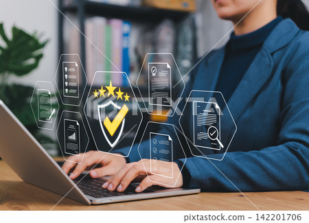Quality Assurance and Compliance Concept. Businesswoman using laptop with icons representing quality control, document verification, audit, certificate, approval, data management, compliance assurance Quality Assurance and Compliance Concept. Businesswoman using laptop with icons representing quality control, document verification, audit, certificate, approval, data management, compliance assurance 142201706