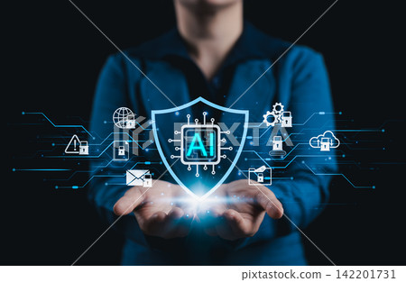 AI cybersecurity protection concept. Person holding digital artificial intelligence shield with secure network icons, locks, cloud data, email privacy, threat defense, encryption, and smart technology AI cybersecurity protection concept. Person holding digital artificial intelligence shield with secure network icons, locks, cloud data, email privacy, threat defense, encryption, and smart technology 142201731