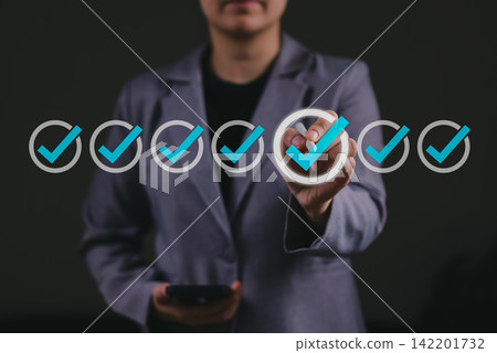 Quality assurance concept, Person selects verified checklist icon showing approval, compliance, audit, customer satisfaction, business review, trusted service process, online testing, exams, quiz, Quality assurance concept, Person selects verified checklist icon showing approval, compliance, audit, customer satisfaction, business review, trusted service process, online testing, exams, quiz, 142201732