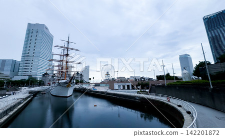 Historic Sailing Ship Nippon Maru and Ferris Wheel in Yokohama Minato Mirai Historic Sailing Ship Nippon Maru and Ferris Wheel in Yokohama Minato Mirai 142201872