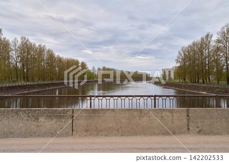 Industrial styled view of bridge and natural reflections Industrial styled view of bridge and natural reflections 142202533