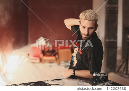 Vivid portrait capturing focused male face with textured background Vivid portrait capturing focused male face with textured background 142202688