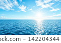 Sunlight, light blue sky and sea, a clear, cloudless sky. 142204344