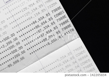Bank account book statement balance number cash, hand holding data investment debt math in office, bill receipt and payment business credit card account, check paper financial loan tax concept. Bank account book statement balance number cash, hand holding data investment debt math in office, bill receipt and payment business credit card account, check paper financial loan tax concept. 142205834