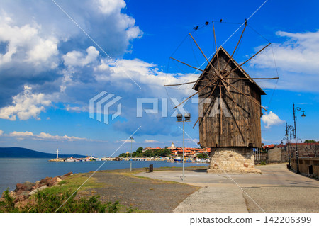 Old wooden windmill in the old town of Nessebar, Bulgaria Old wooden windmill in the old town of Nessebar, Bulgaria 142206399