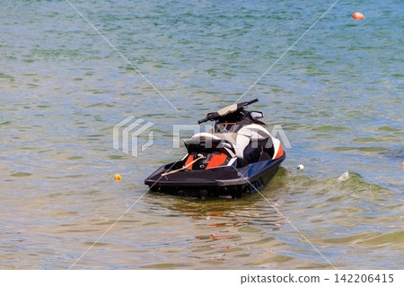 Empty personal watercraft in a sea. Summer vacation concept Empty personal watercraft in a sea. Summer vacation concept 142206415