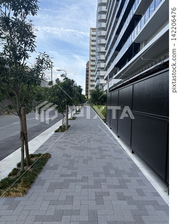 Cityscape with apartment buildings, sidewalk Cityscape with apartment buildings, sidewalk 142206476