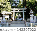 A view of the historic stone torii gate from the front of the approach to Abita Shrine, Minoh City, Osaka Prefecture. 142207022