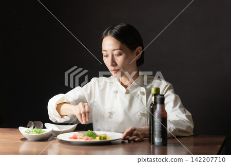Female chef Female chef 142207710