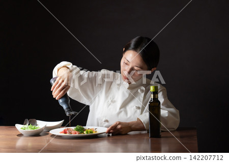 Female chef Female chef 142207712
