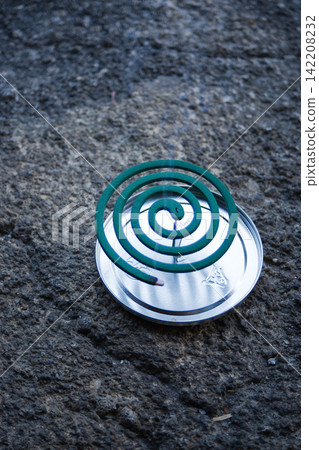 Mosquito coils are a quintessential symbol of summer in Japan. Mosquito coils are a quintessential symbol of summer in Japan. 142208232