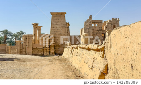Medinet Habu, the mortuary temple of Ramesses III, located on the west bank of Luxor, Egypt. Medinet Habu, the mortuary temple of Ramesses III, located on the west bank of Luxor, Egypt. 142208399