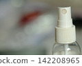 Small white spray nozzle with space for text. 142208965