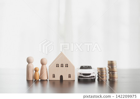 Family figures, wooden house, white model car, and rising coin stacks represent household savings, property and vehicle goals, mortgage planning, financial security, and long-term family prosperity. Family figures, wooden house, white model car, and rising coin stacks represent household savings, property and vehicle goals, mortgage planning, financial security, and long-term family prosperity. 142209975