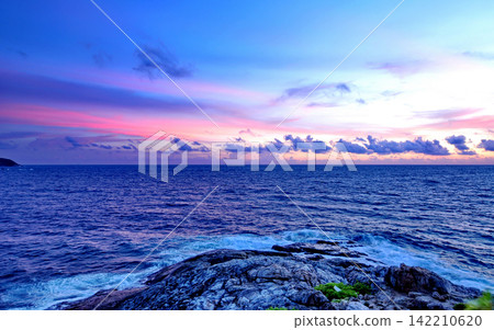 Ocean Sunset Seascape with Rocky Coast and Colorful Sky Ocean Sunset Seascape with Rocky Coast and Colorful Sky 142210620