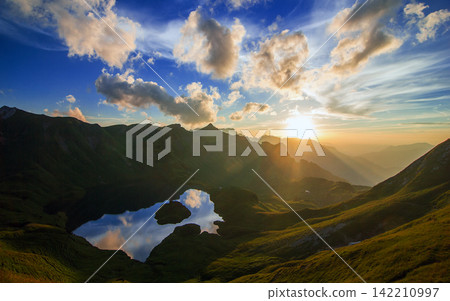 Mountain Lake Sunrise Panorama with Dramatic Clouds Mountain Lake Sunrise Panorama with Dramatic Clouds 142210997